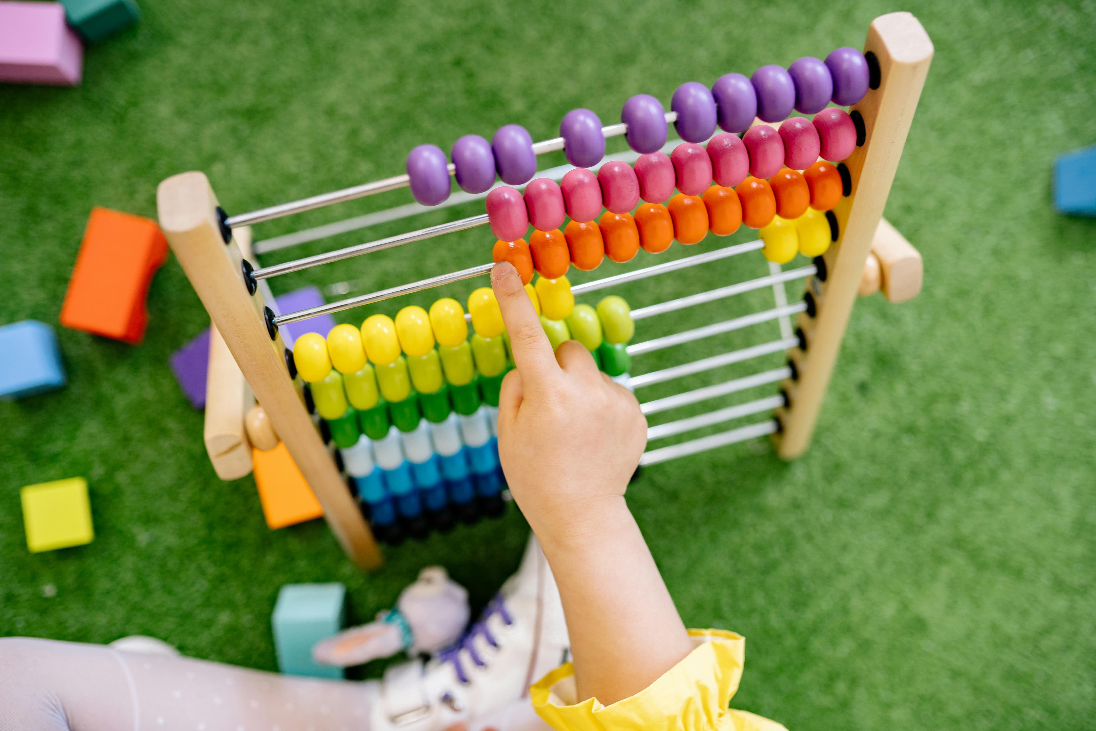 Children engaged in creative play at Green Acres Child Care